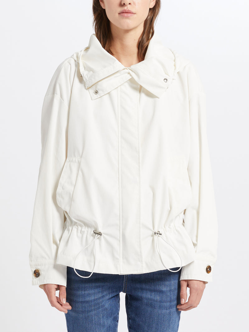 Marella Scrigno Raincoat. A flared fit white raincoat with high neck, gathered hem, drawstrings and zip closure, made from a water repellent material.