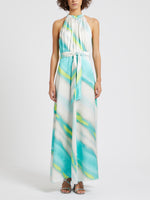 Marella Paella Halter Long Neck Dress. A sleeveless maxi dress with halter neck, keyhole detail, and belt. this dress features an aquamarine pattern.