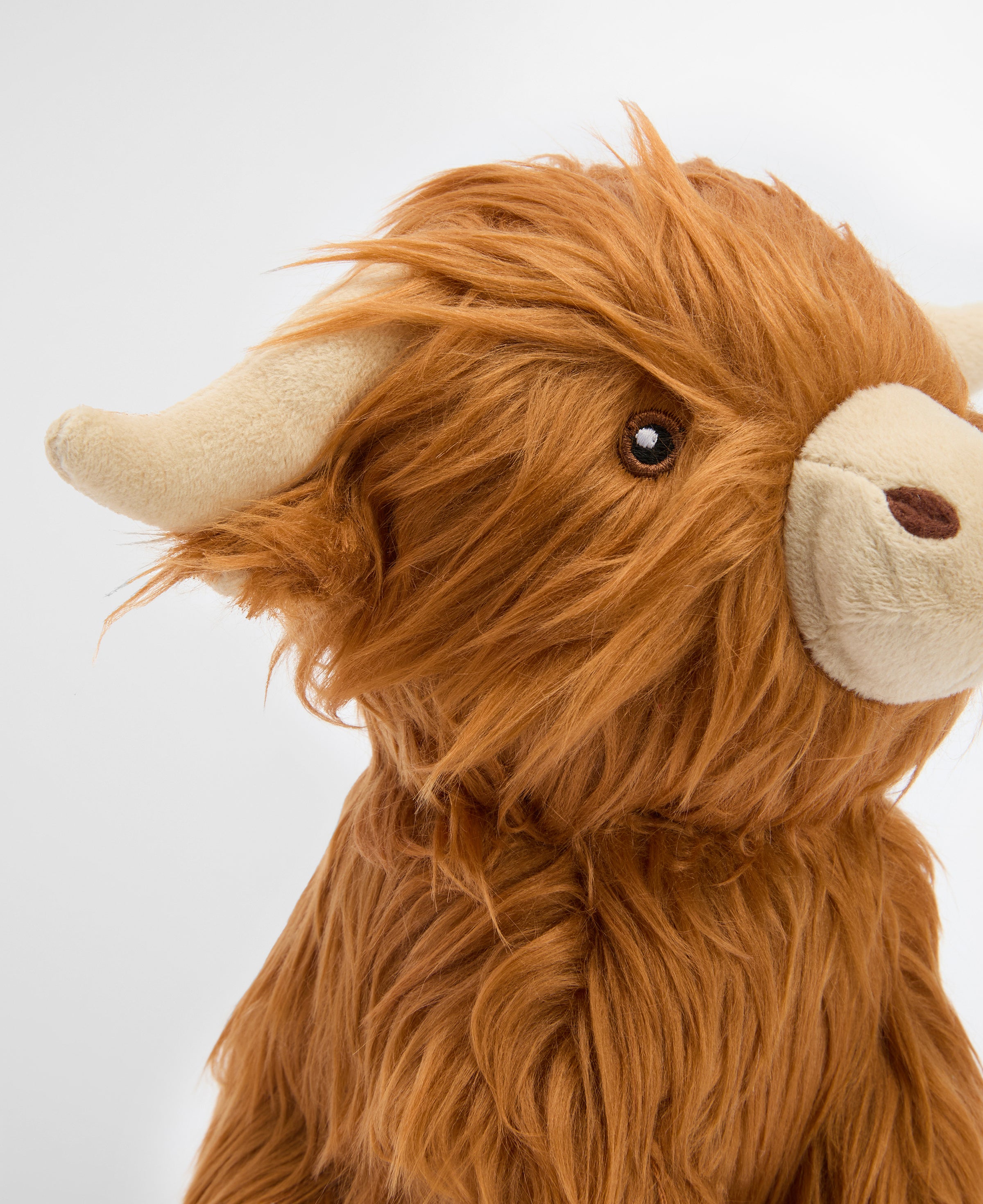 An image of the Barbour Dog Highland Cow Toy