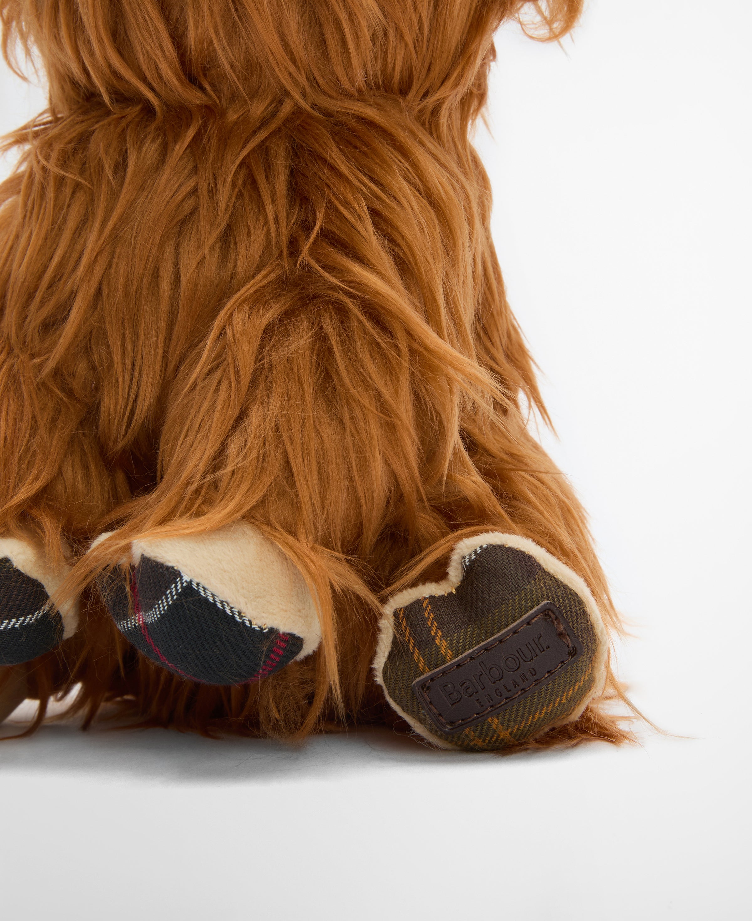 An image of the Barbour Dog Highland Cow Toy
