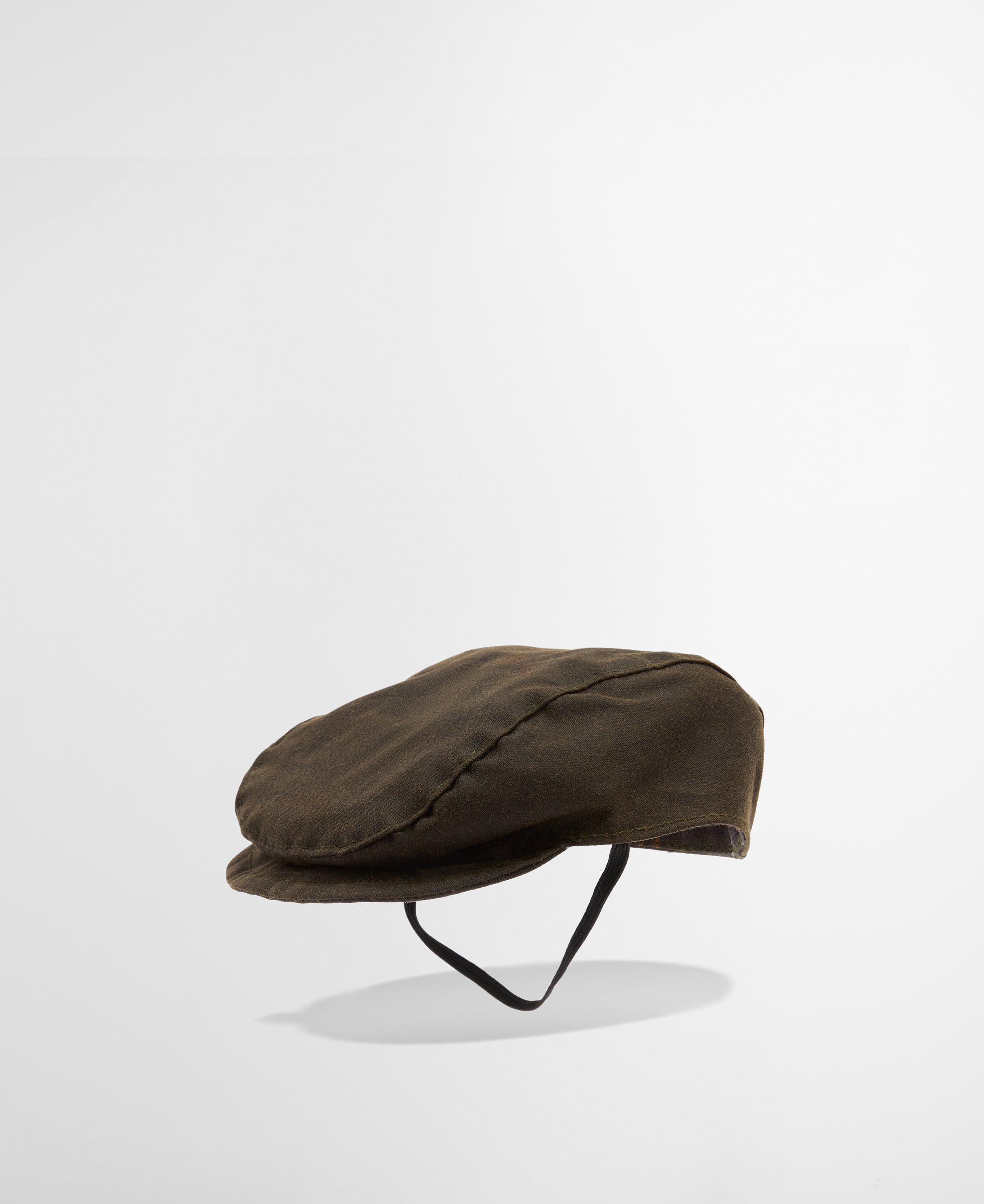 An image of the Barbour Dog Wax Flat Cap