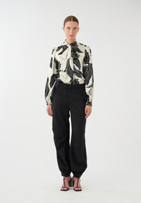 An image of the Dea Kudibal Silk Printed Tie Neck Blouse