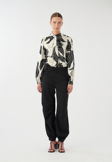 An image of the Dea Kudibal Silk Printed Tie Neck Blouse