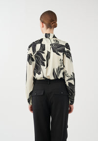An image of the Dea Kudibal Silk Printed Tie Neck Blouse