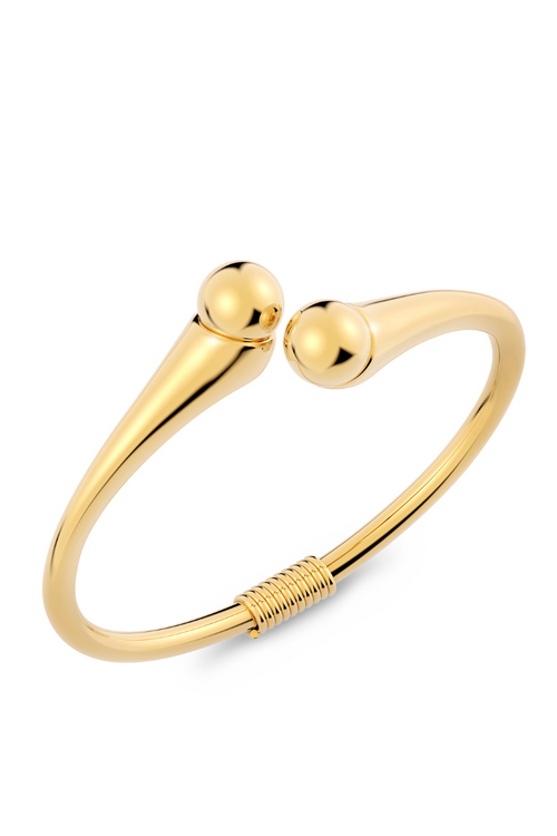 Edblad Diego Bangle. A gold plated bangle with sphere design.