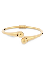 Edblad Diego Bangle. A gold plated bangle with sphere design.
