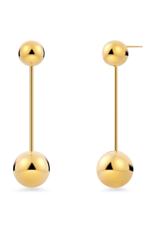 Edblad Diego Earrings. A pair of gold plated dangly earrings with spherical shape design.