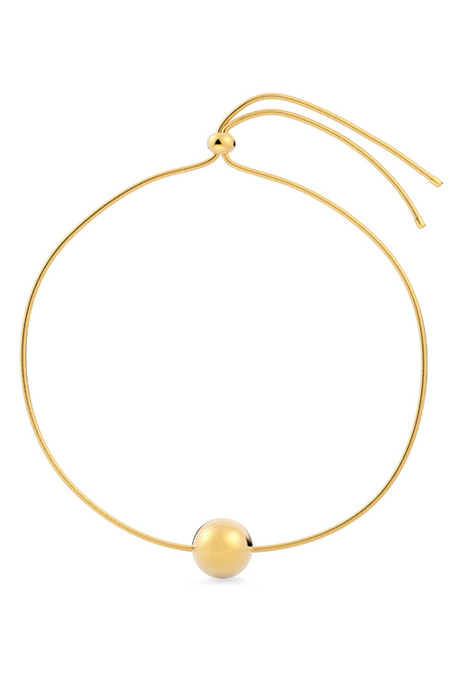 Edblad Diego Necklace. An adjustable gold plated necklace with sphere detail.