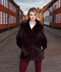 An image of the Pia Rossini Donatella Coat