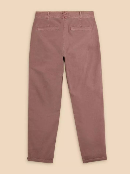 White Stuff Twister Chino Trouser. Tapered leg women's chinos in dusty pink with full length style and button & zip fastening.