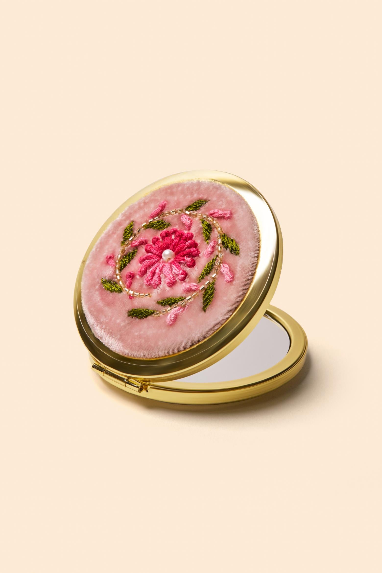 An image of the Powder Embroidered Mirror