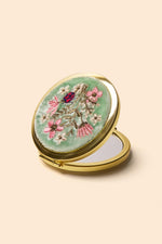 An image of the Powder Embroidered Mirror