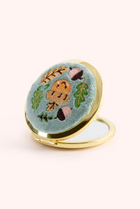 An image of the Powder Embroidered Mirror