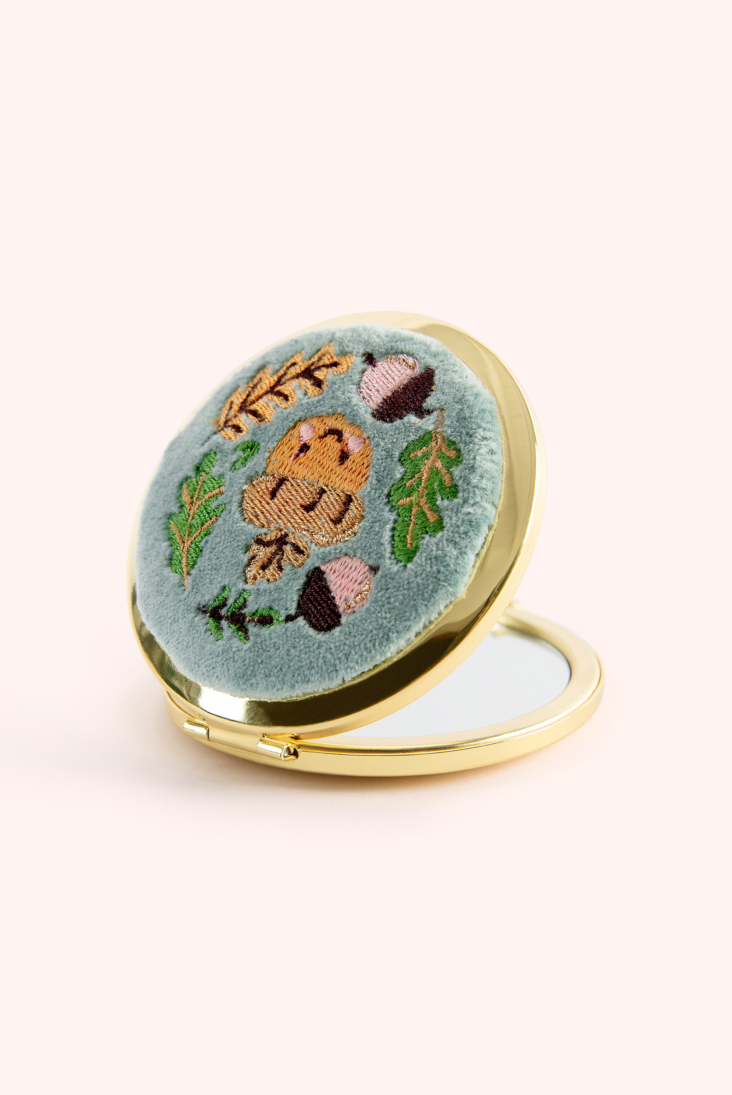 An image of the Powder Embroidered Mirror