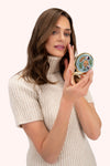An image of the Powder Embroidered Mirror