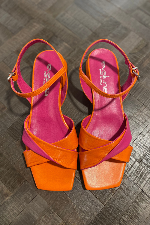 An image of the Evaluna Adel Flat Strappy Sandals in the colour Arancio - a blend of orange and pink.