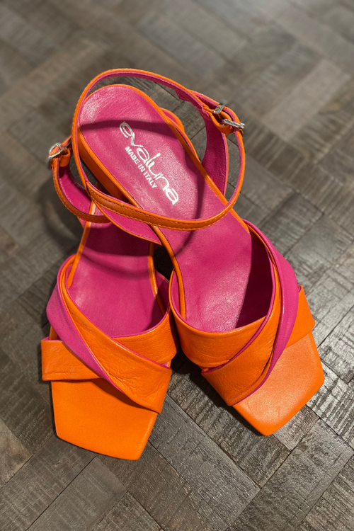 An image of the Evaluna Adel Flat Strappy Sandals in the colour Arancio - a blend of orange and pink.