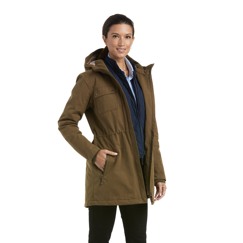 An image of a female model wearing the Ariat Argentium Insulated Parka in the colour Earth.