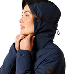 An image of a female model wearing the Ariat Valour Waterproof Jacket in the colour Navy Black.