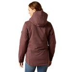 An image of a female model wearing the Ariat Sterling Waterproof Insulated Parka in the colour Raisin Pink.