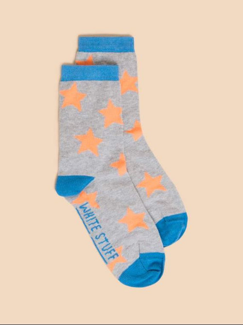 White Stuff Star Socks. Organic cotton mix ankle socks with blue hem, toe and heel, and bright orange stars on a grey background.