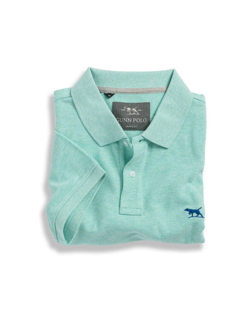 Rodd & Gunn Gunn Polo. A sports fit polo with short sleeves and collared neckline, this polo features a logo on the chest and is a mint colour.
