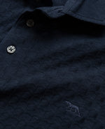 Rodd & Gunn Huntsbury Short Sleeve Shirt. An original fit short sleeve polo with collared neckline and mother of pearl buttons. This shirt comes in a stretchy navy fabric.