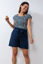 Lily & Me Naomi Shorts. A mid-thigh length short with waist tie and pockets in the colour navy.