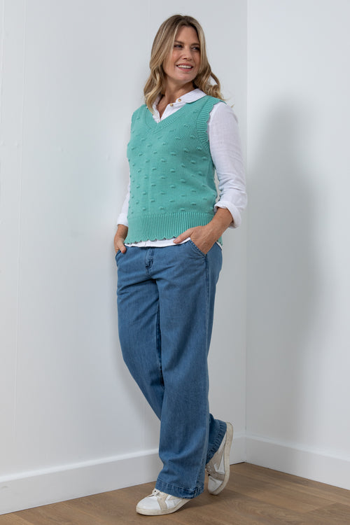 Lily & Me Saffy Tank Top. A sleeveless V-neck top with bubble stitch detail and scalloped hem in sea green.