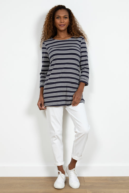 Lily & Me Coastal Stripe Tunic. An effortless look top with 3/4 length sleeves and boat neck. This tunic has a navy and white striped pattern.