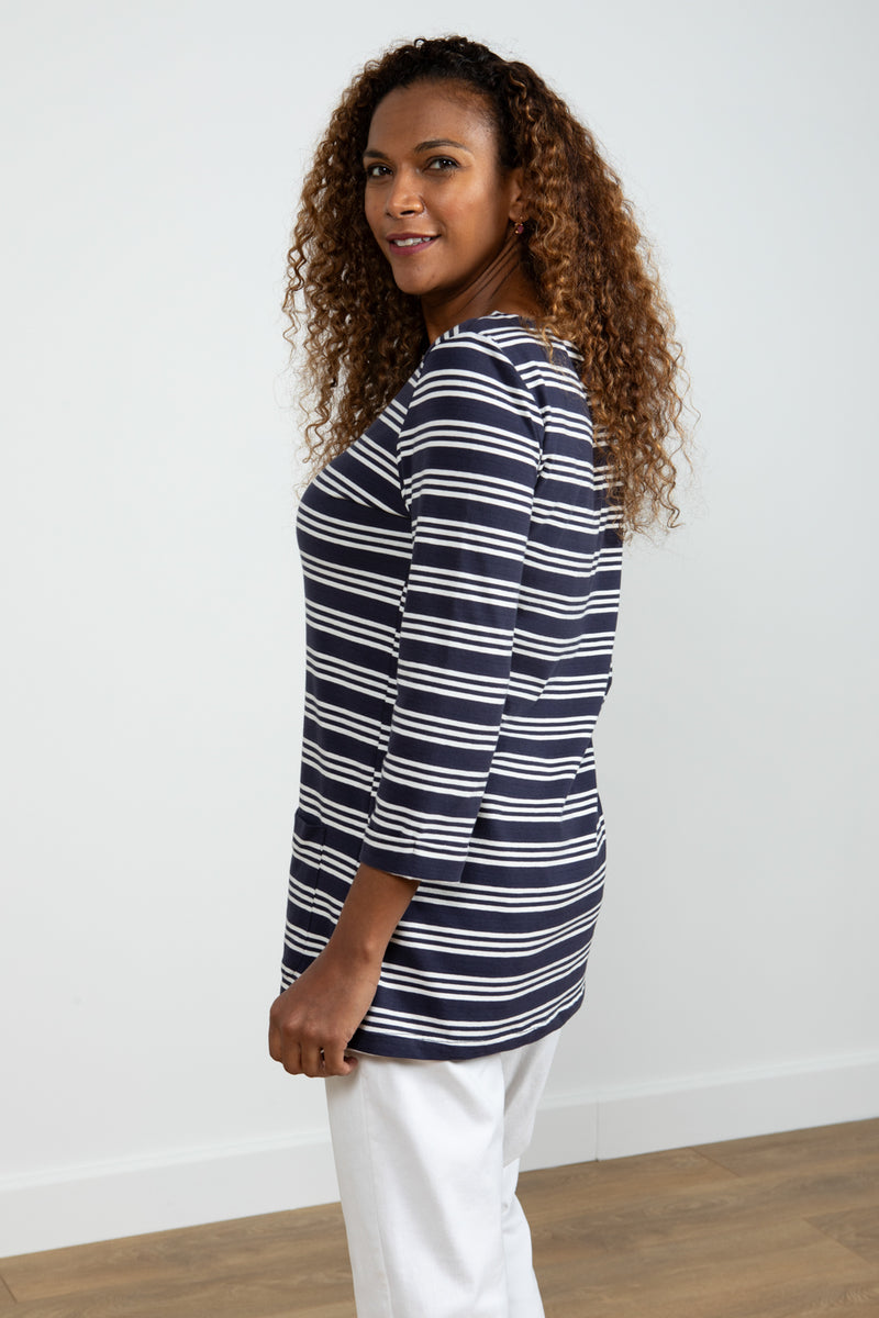 Lily & Me Coastal Stripe Tunic. An effortless look top with 3/4 length sleeves and boat neck. This tunic has a navy and white striped pattern.