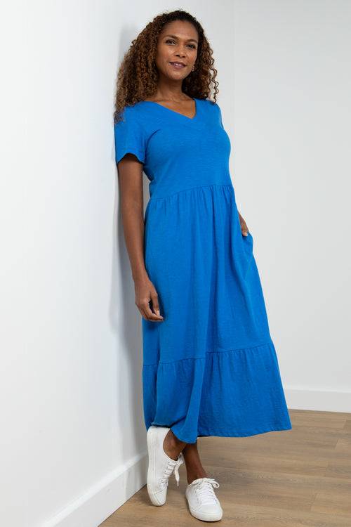 Lily & Me Midi Spring Dress. A short sleeve, V-neck, tiered dress in a vibrant blue colour.