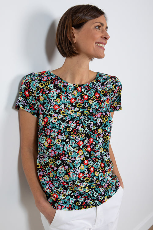 Lily & Me Rosali Top Wildflower. A cap sleeve, round neck top with multicoloured floral print.