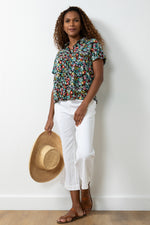 Lily & Me Saltgrass Shirt Wildflower. A collared shirt with raglan cap sleeves and multicoloured floral print.