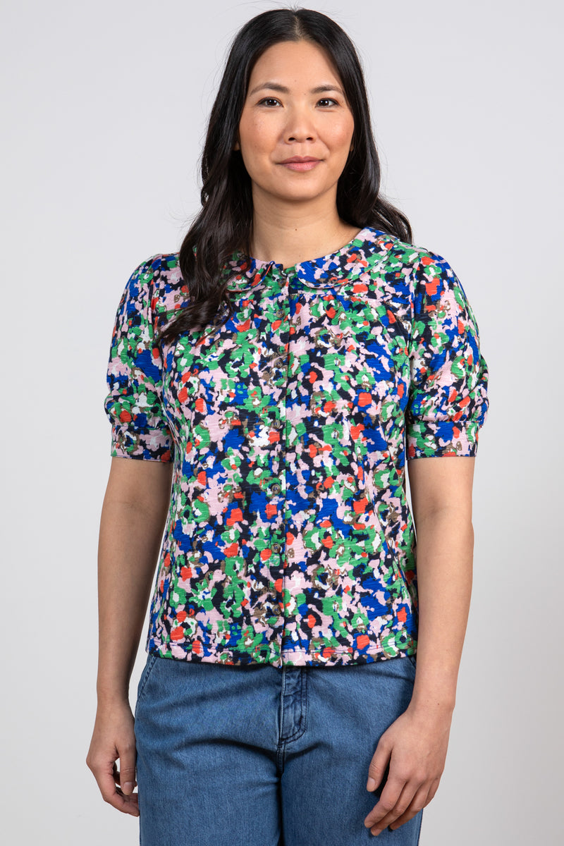 Lily & Me Frieda Lily Top. A peter pan collared top with short cuffed sleeves in a bold cobalt blue print.