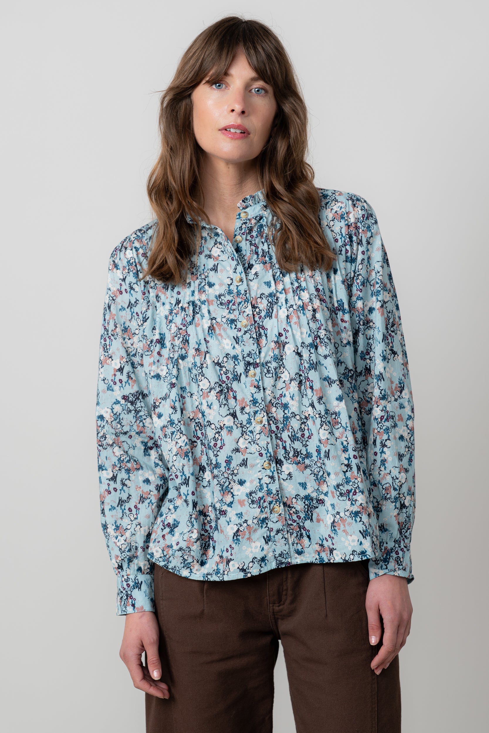 An image of the Lily & Me Flora Blouse Feather Ditsy