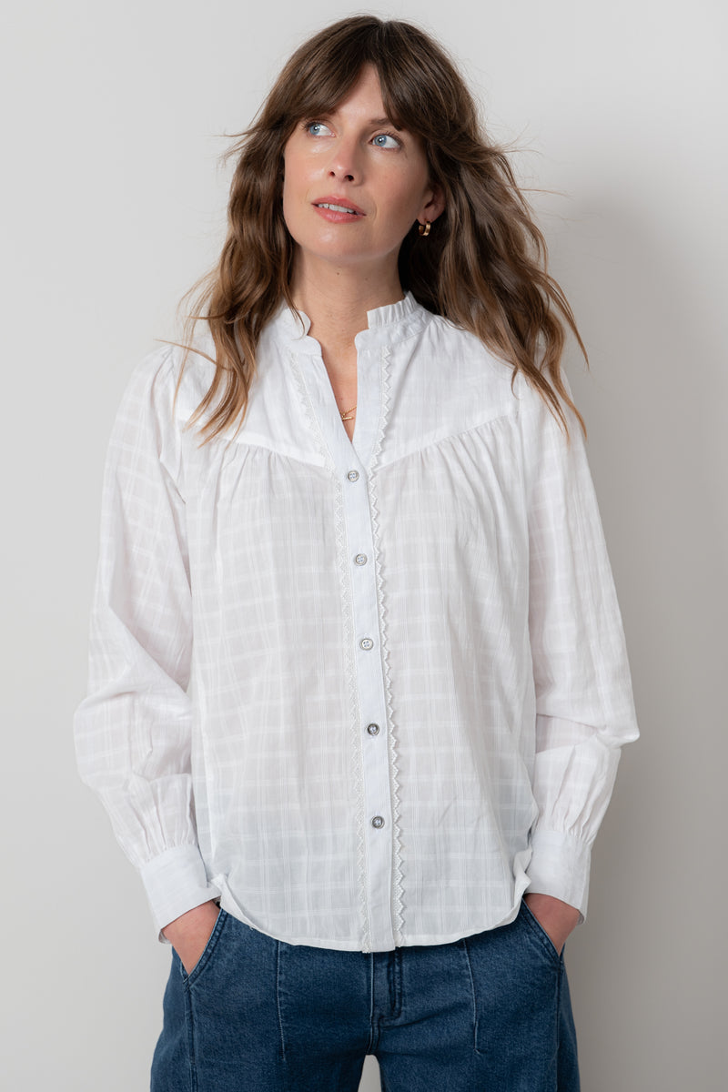 An image of the Lily & Me Wayfaring Blouse Plain Check