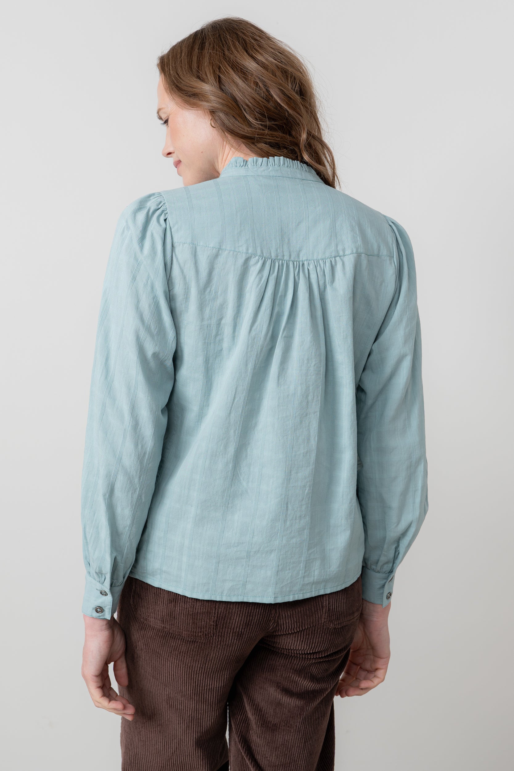 An image of the Lily & Me Wayfaring Blouse Plain Check