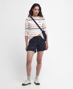 An image of a female model wearing the Barbour Hawkins Top in the colour Cloud Stripe.