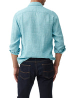 Rodd & Gunn Coromandel Long Sleeve Shirt. A long sleeve shirt with collared neckline, button closures and faded look. This shirt is a washed teal colour.