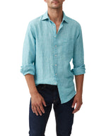 Rodd & Gunn Coromandel Long Sleeve Shirt. A long sleeve shirt with collared neckline, button closures and faded look. This shirt is a washed teal colour.