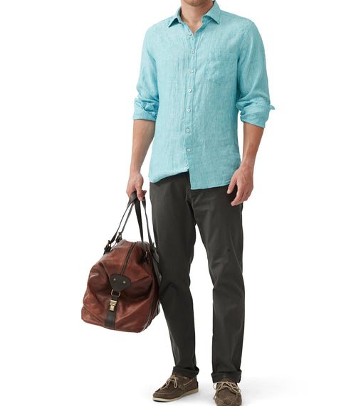 Rodd & Gunn Coromandel Long Sleeve Shirt. A long sleeve shirt with collared neckline, button closures and faded look. This shirt is a washed teal colour.