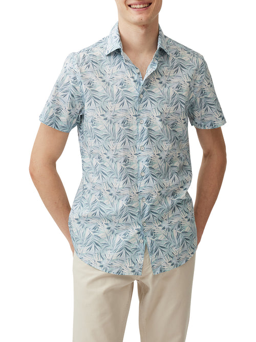 Rodd & Gunn Cherry Tree Bay. A sports fit shirt with short sleeves and collared neckline. This shirt has vintage-look buttons and a blue leaf print.