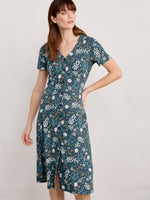 An image of a model wearing the Seasalt Lilian Tea Dress in the colour Sketched Field Light Squid.