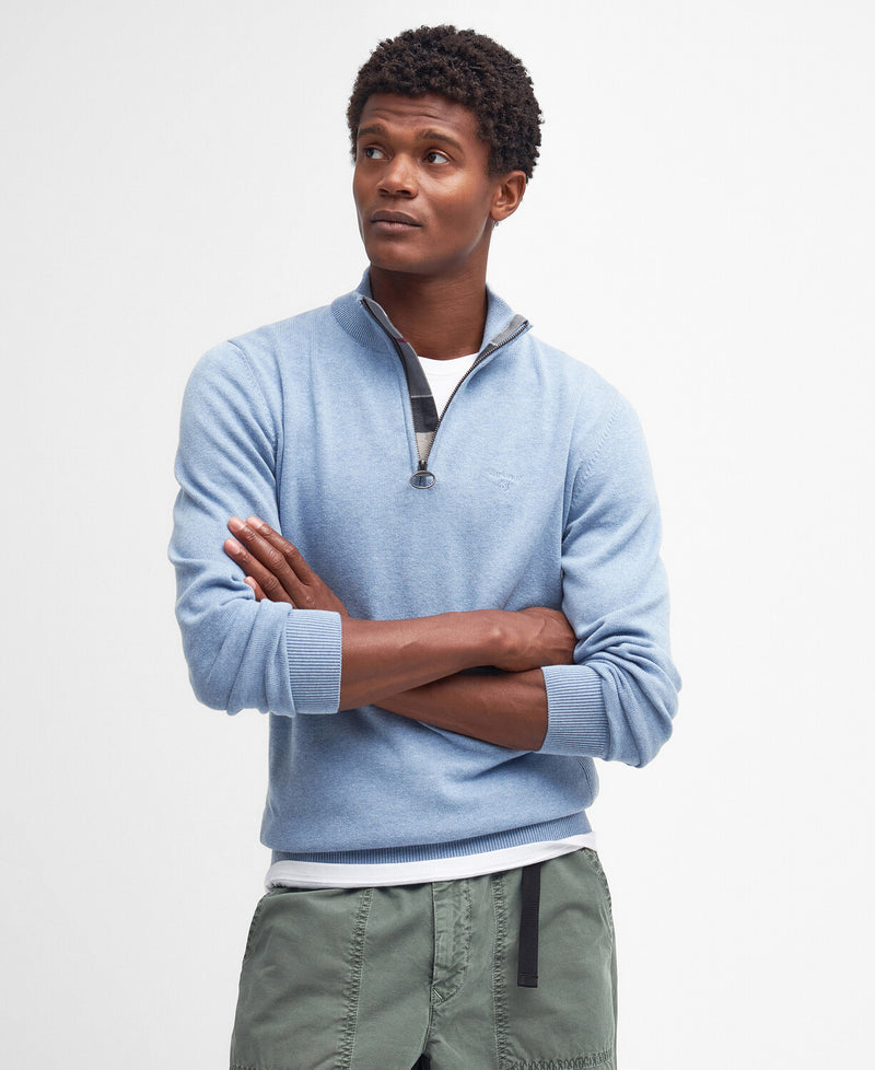 An image of a male model wearing the Barbour Cotton Half Zip Jumper in the colour Dark Chambray.