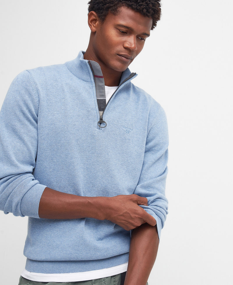 An image of a male model wearing the Barbour Cotton Half Zip Jumper in the colour Dark Chambray.