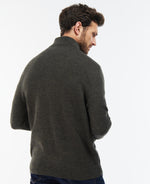 An image of a male model wearing the Barbour Firle Half Zip Sweatshirt in the colour Olive Marl.