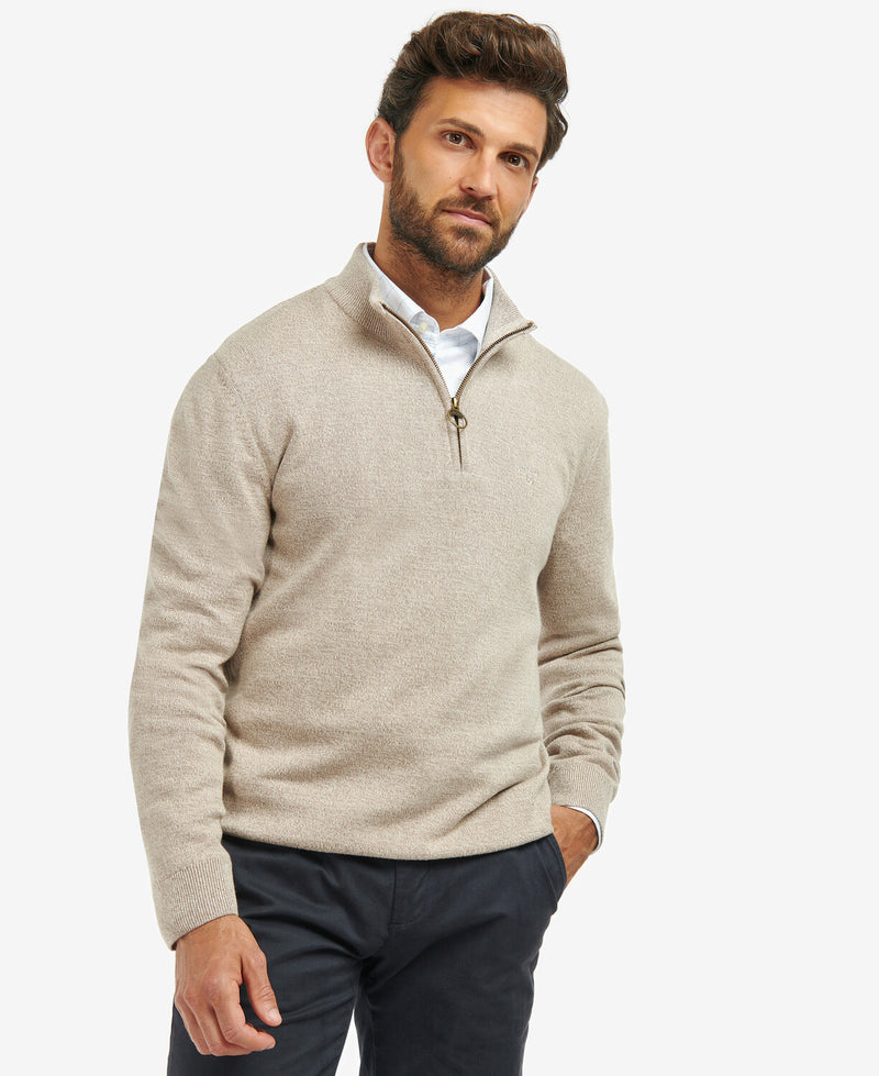An image of a male model wearing the Barbour Firle Half Zip Sweatshirt in the colour Stone Marl.