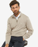 An image of a male model wearing the Barbour Firle Half Zip Sweatshirt in the colour Stone Marl.