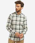 An image of a male model wearing the Barbour Falstone Tailored Long-Sleeved Checked Shirt in the colour Stone.